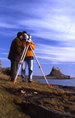 Surveying on Holy Island. Photo courtesy of The Archaeological Practice.