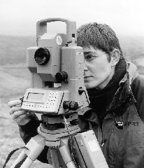 Using a total station theodolite.Photo courtesy of Mark Bowden and copyright to English Heritage
